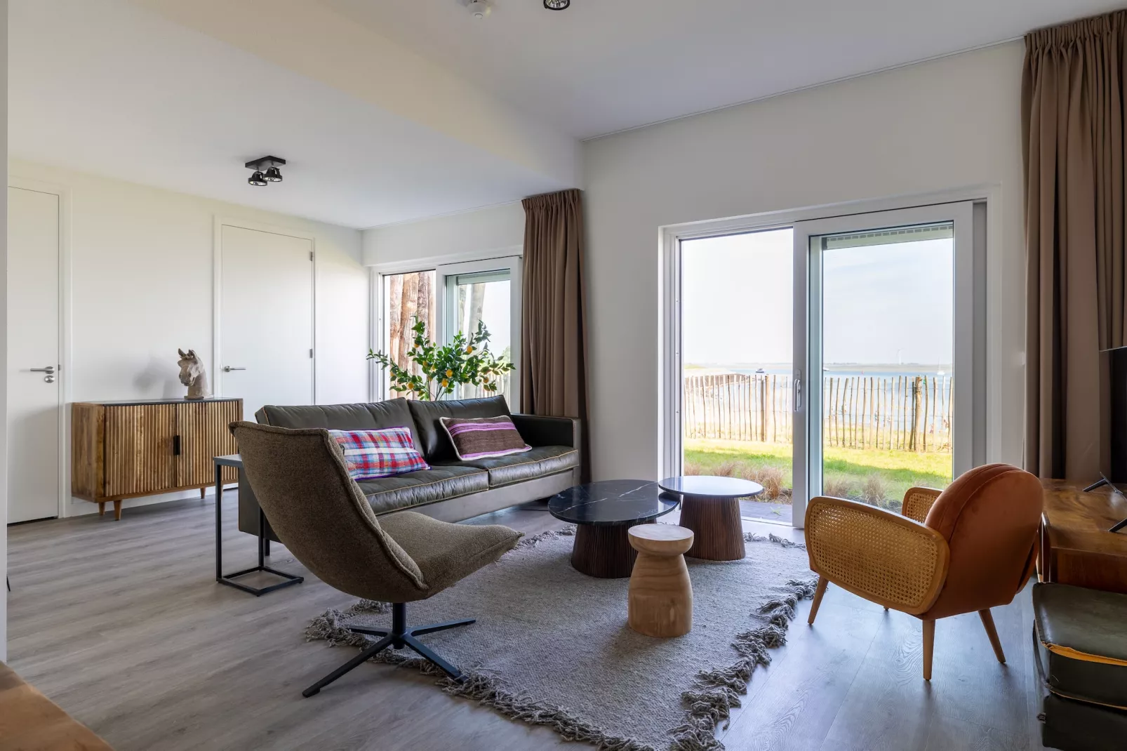 Luxe appartement Vista Maris 'Laguna Beach House' - Havenweg 8-32  Sint-Annaland Oosterschelde-Living room