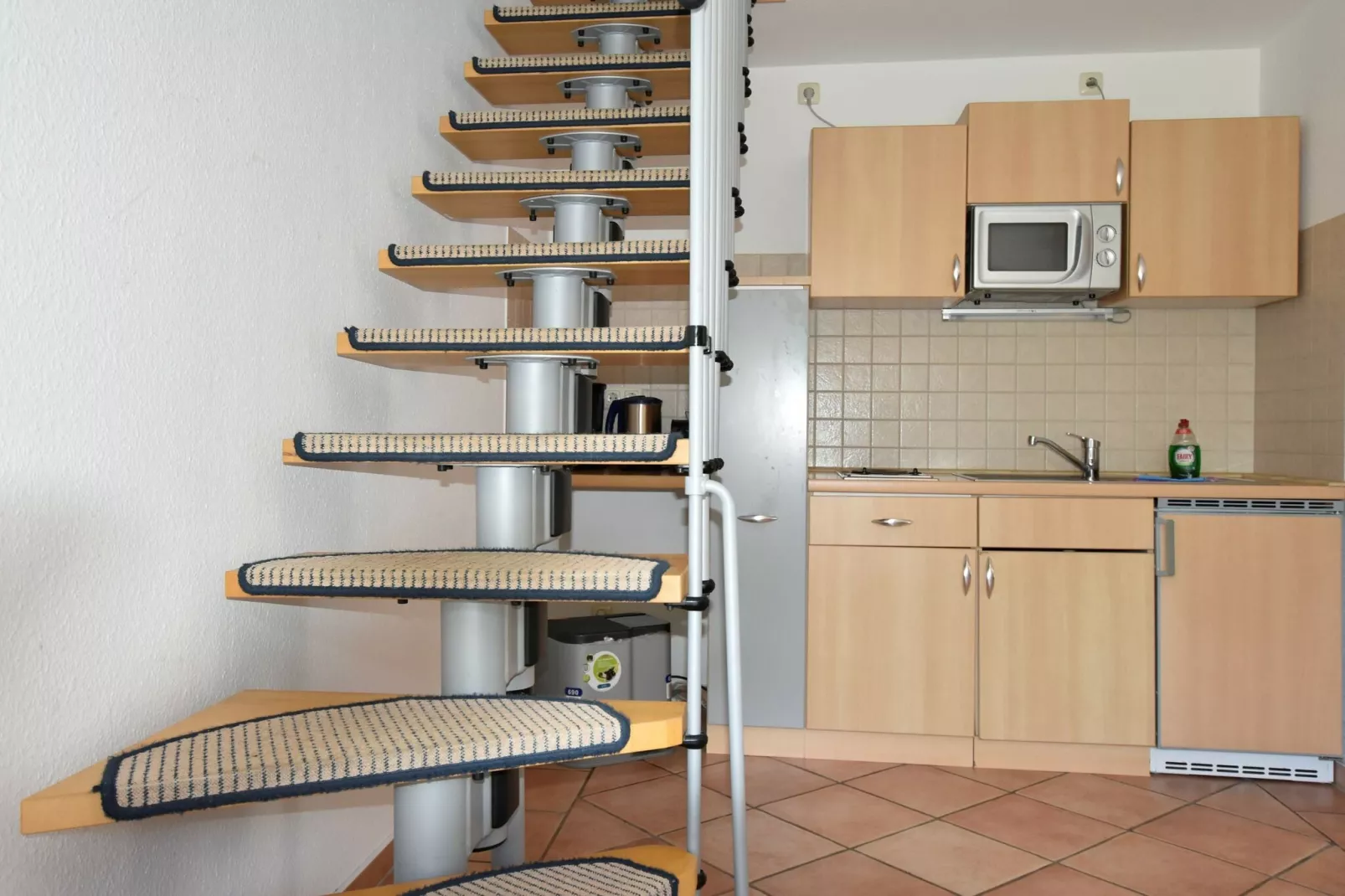 Bernstein mit Balkon am Sandstrand-Kitchen