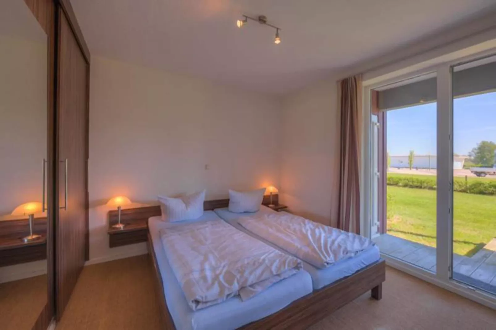 Kapitänshaus Gartendeck 64 qm Nr 412-Bedroom