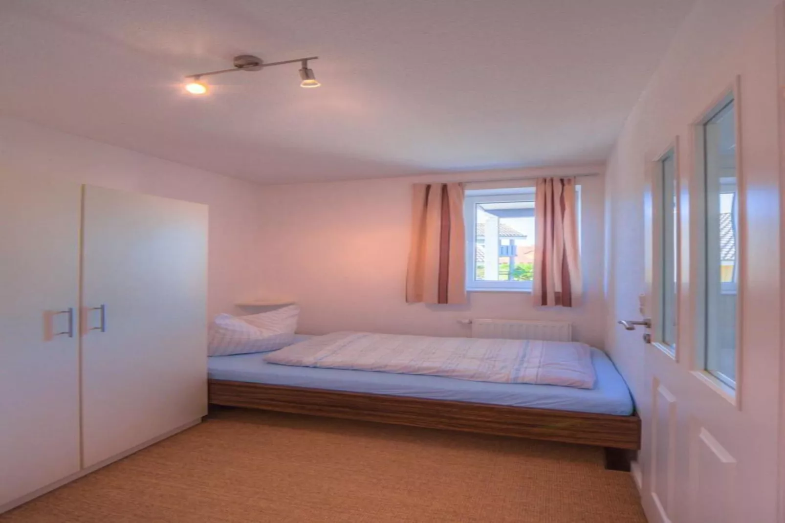 Kapitänshaus Gartendeck 64 qm Nr 412-Bedroom