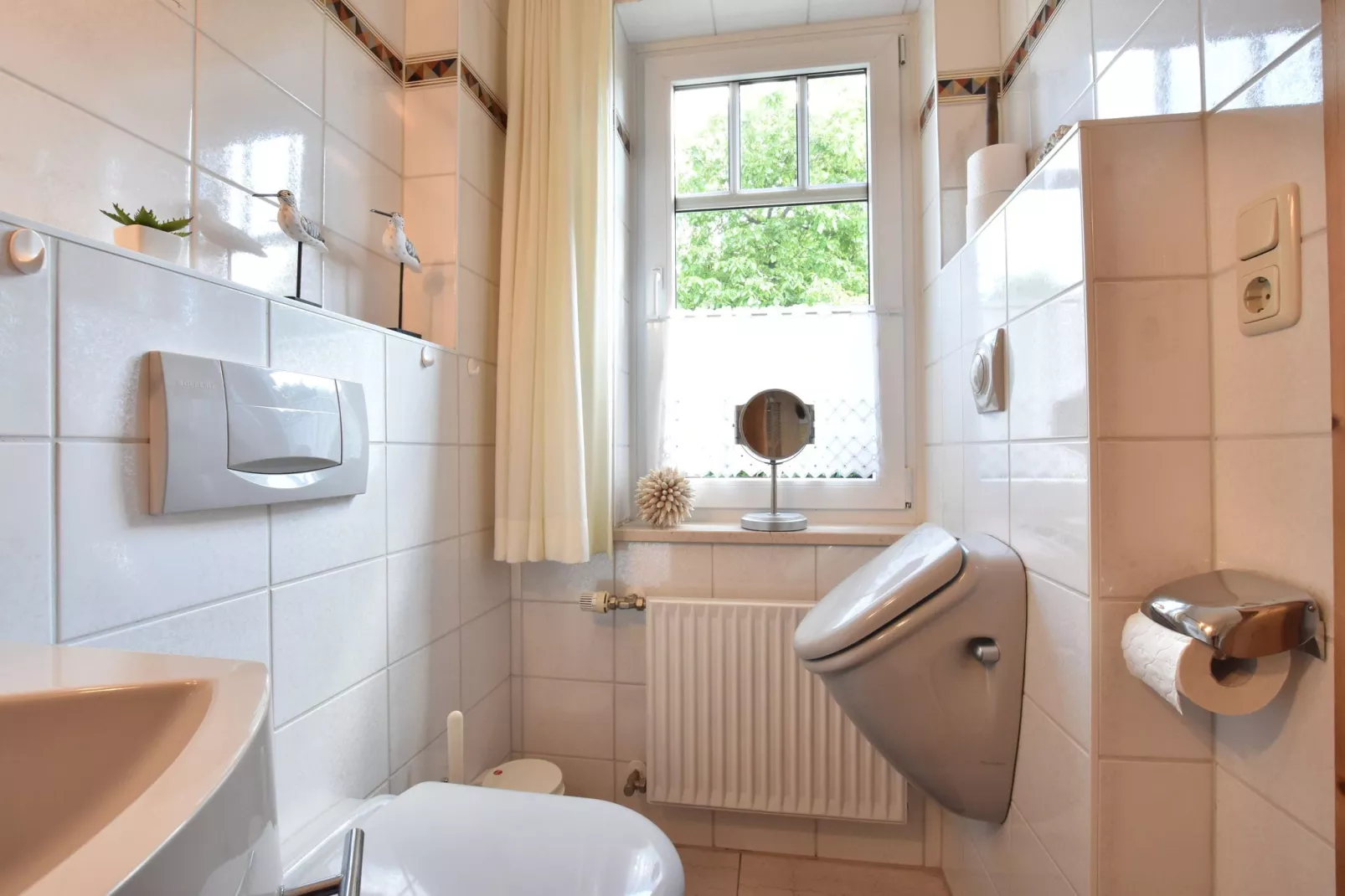 Romantische Ferienwohnung an der Ostsee mit Garten-Badezimmer