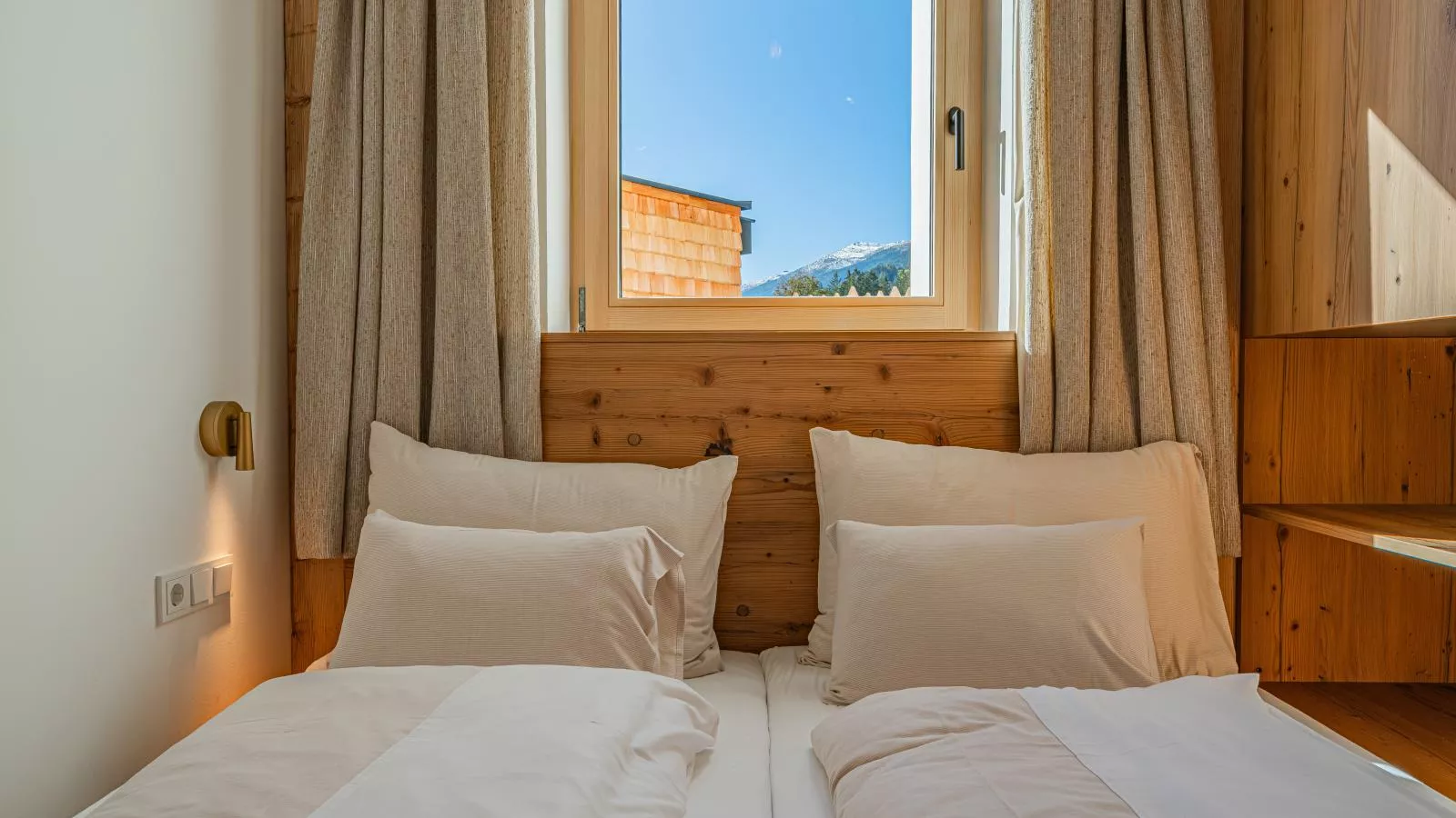 Premium Apartments SunnseitPanorama-Schlafzimmer