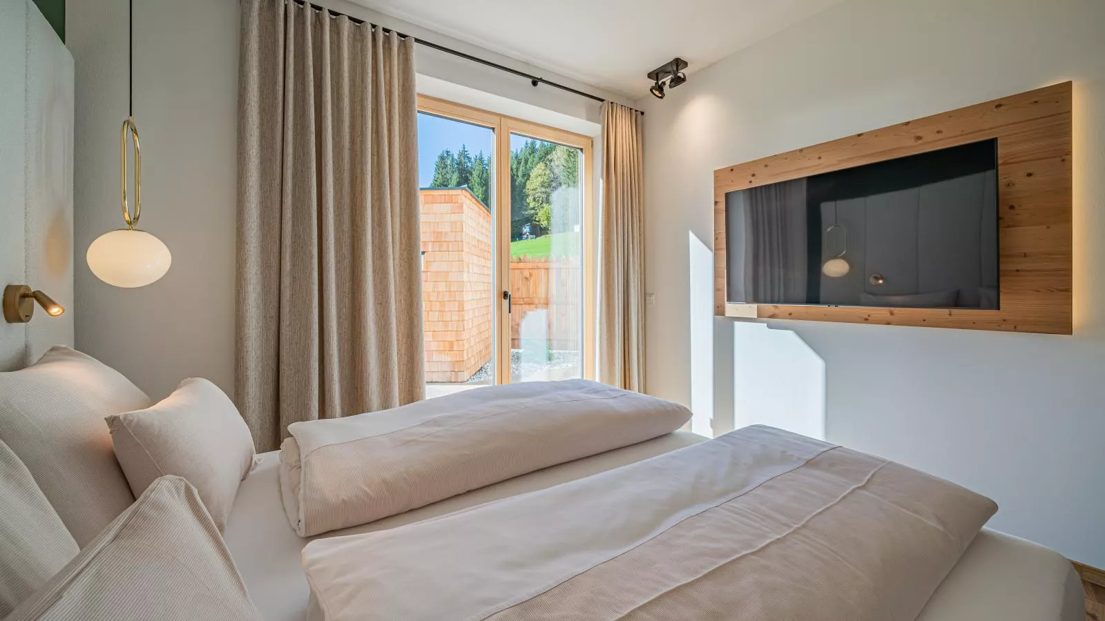 Premium Apartments SunnseitPanorama-Schlafzimmer