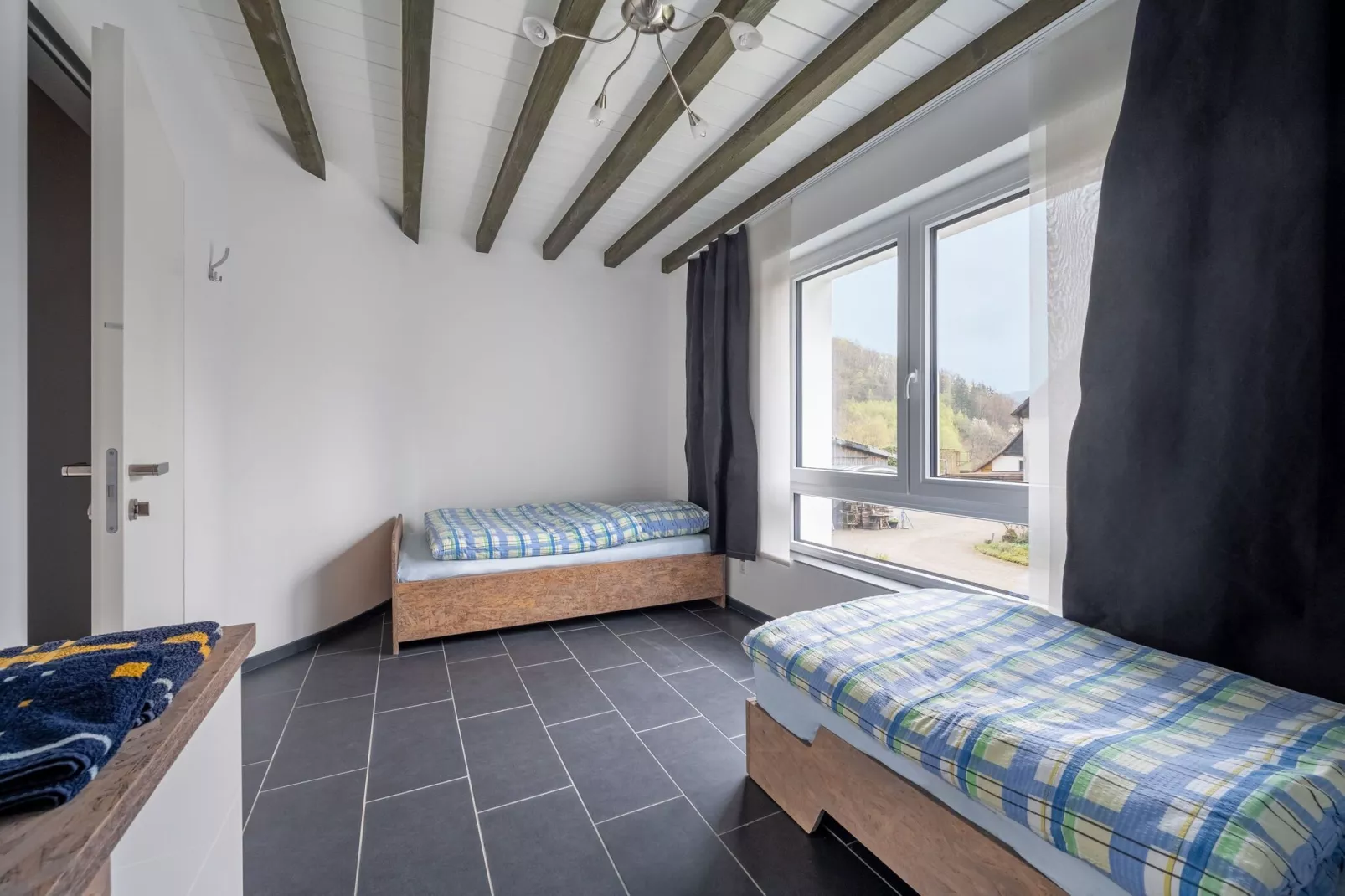 Green Buildings Ferienwohnung Herscheid-Sauerland-Schlafzimmer