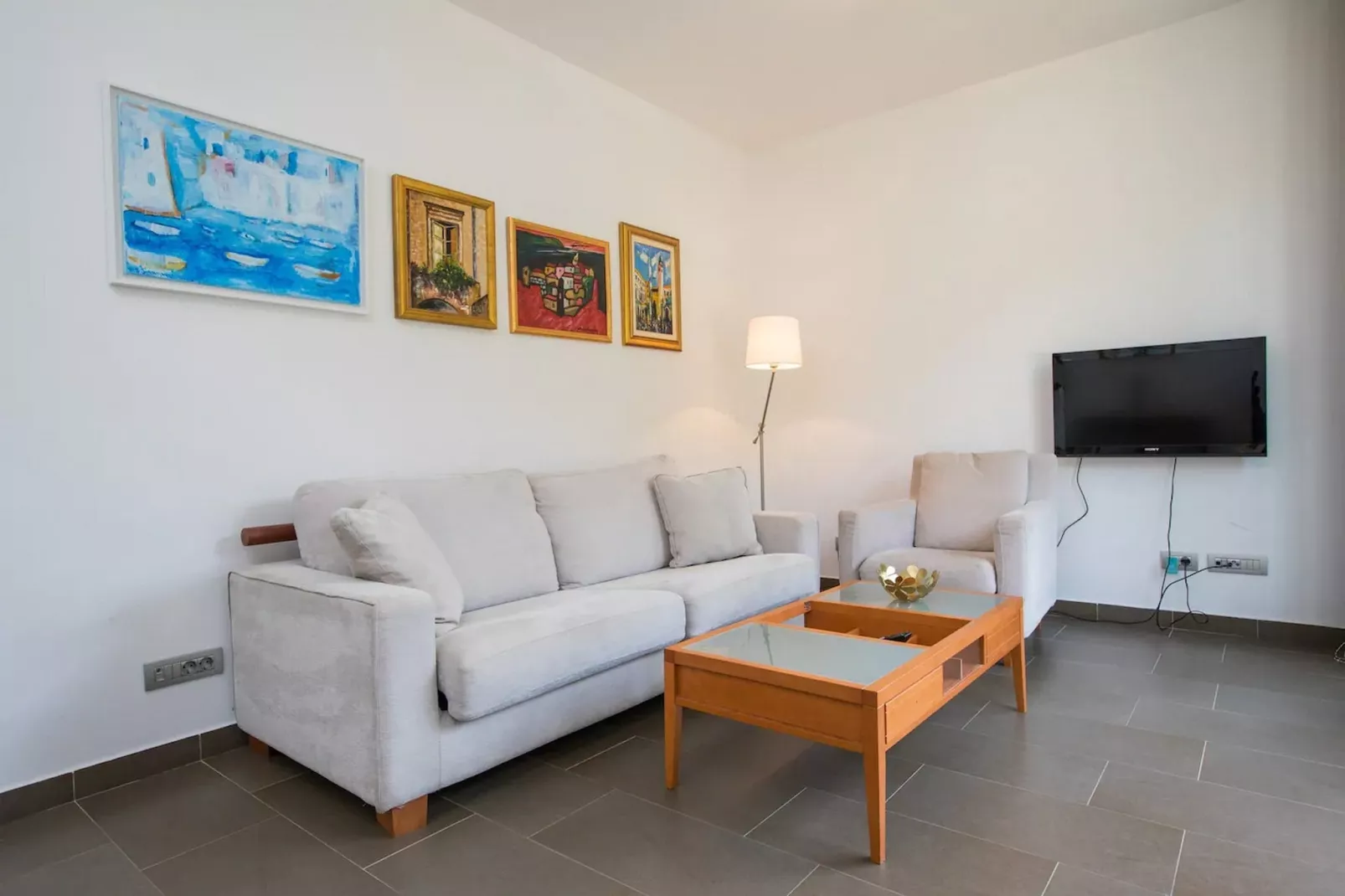 City Holiday Apartment - One Bedroom Apartment with Terrace-Living room