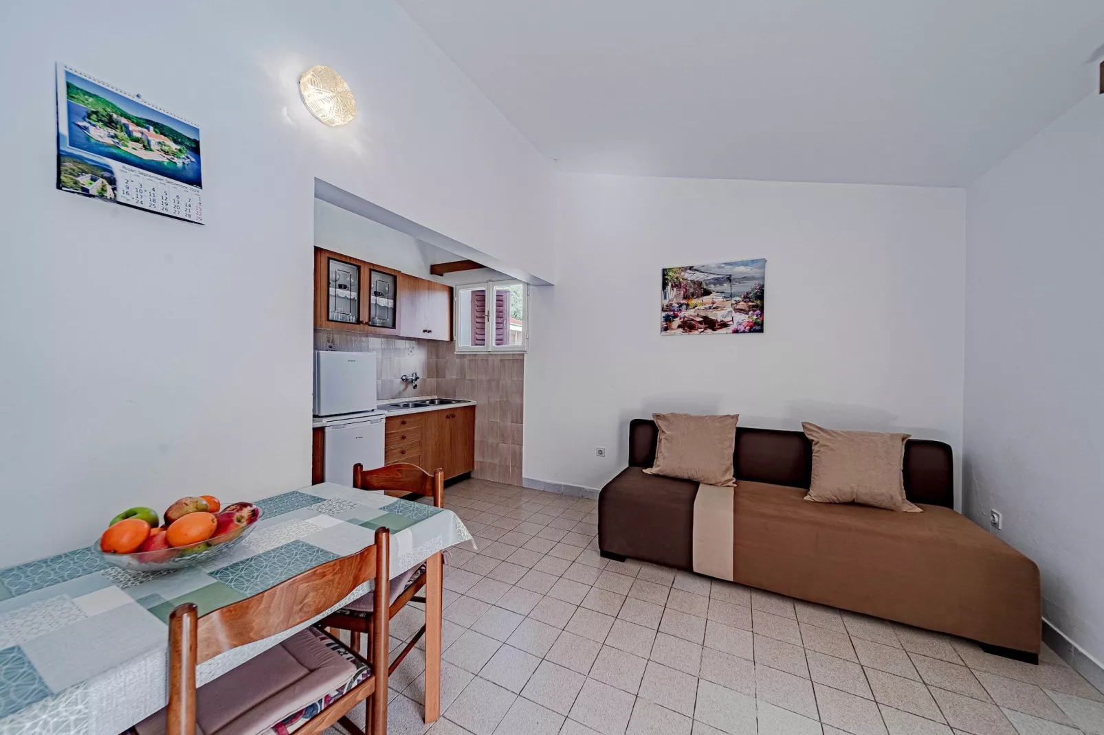Apartments Kuzma - One-Bedroom Apartment with Balcony and Sea View-Living room