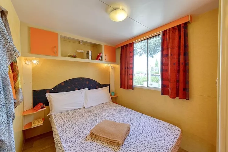Caravanpark San Benedetto Camping Relais Peschiera / MH Tahiti-Bedroom