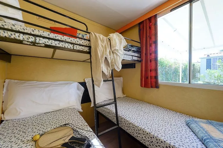 Caravanpark San Benedetto Camping Relais Peschiera / MH Tahiti-Bedroom