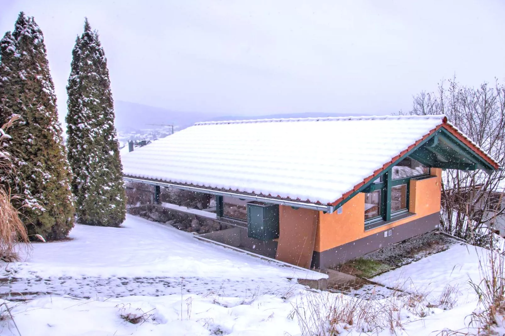 Holiday home with sauna in Viechtach-Exterior winter