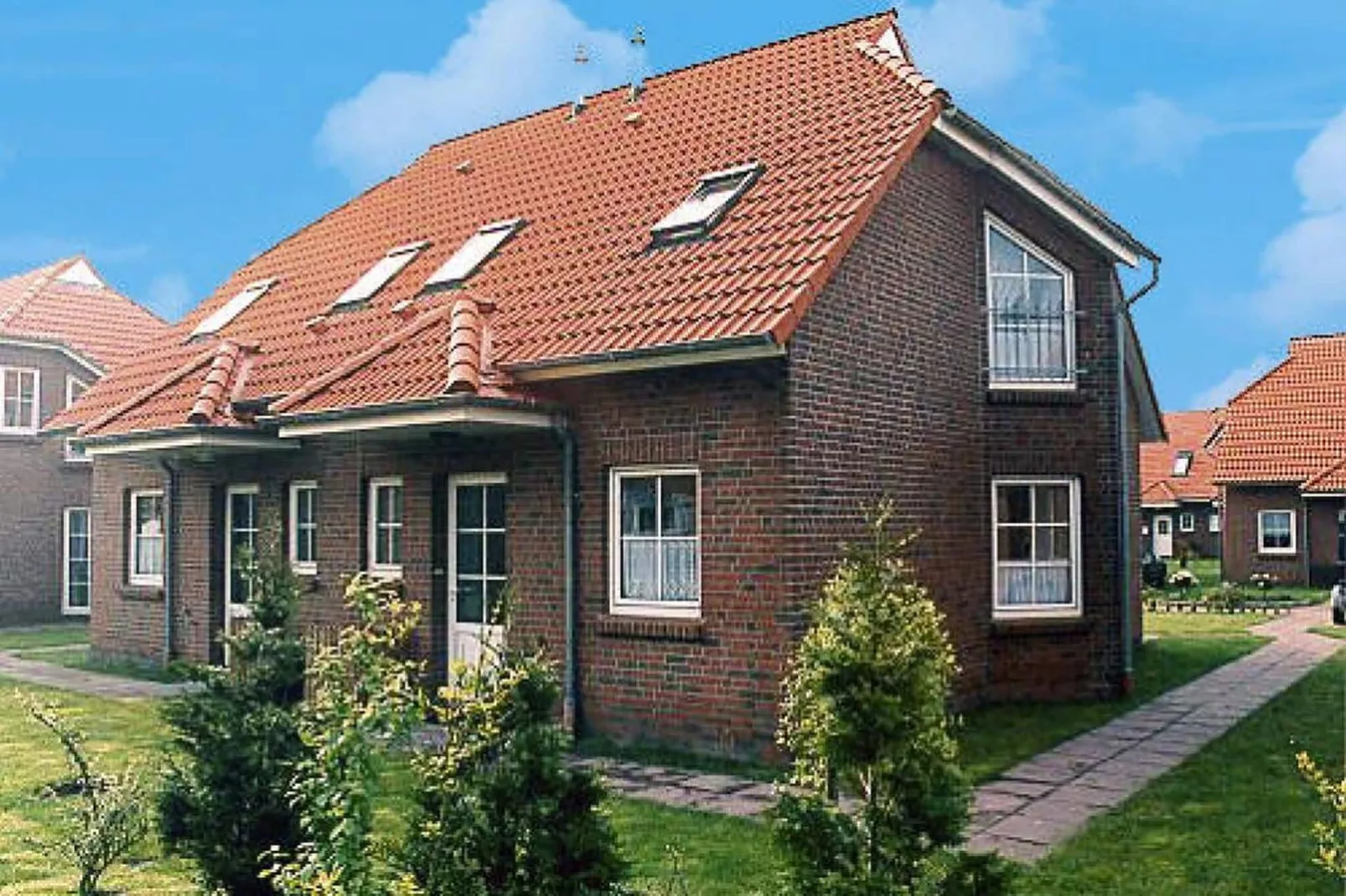 Doppelhaushälfte mit Sonnenterrasse in Neßmersiel-Exterior summer