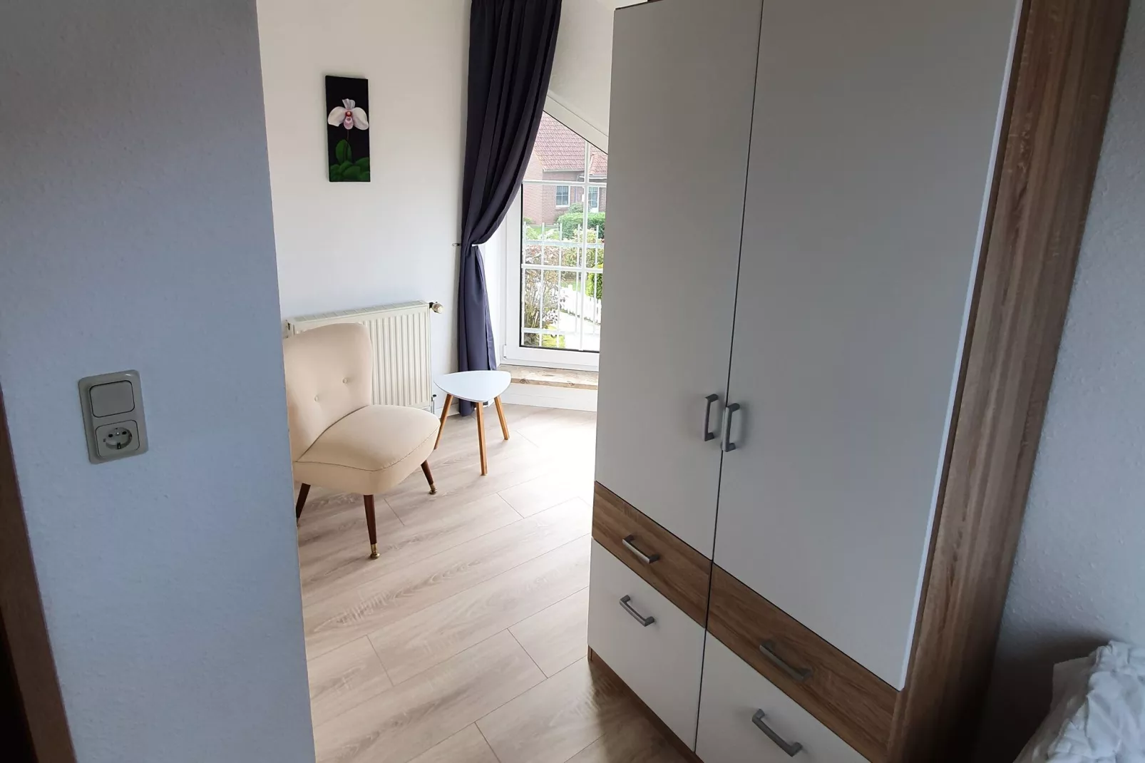 Doppelhaushälfte mit Sonnenterrasse in Neßmersiel-Bedroom