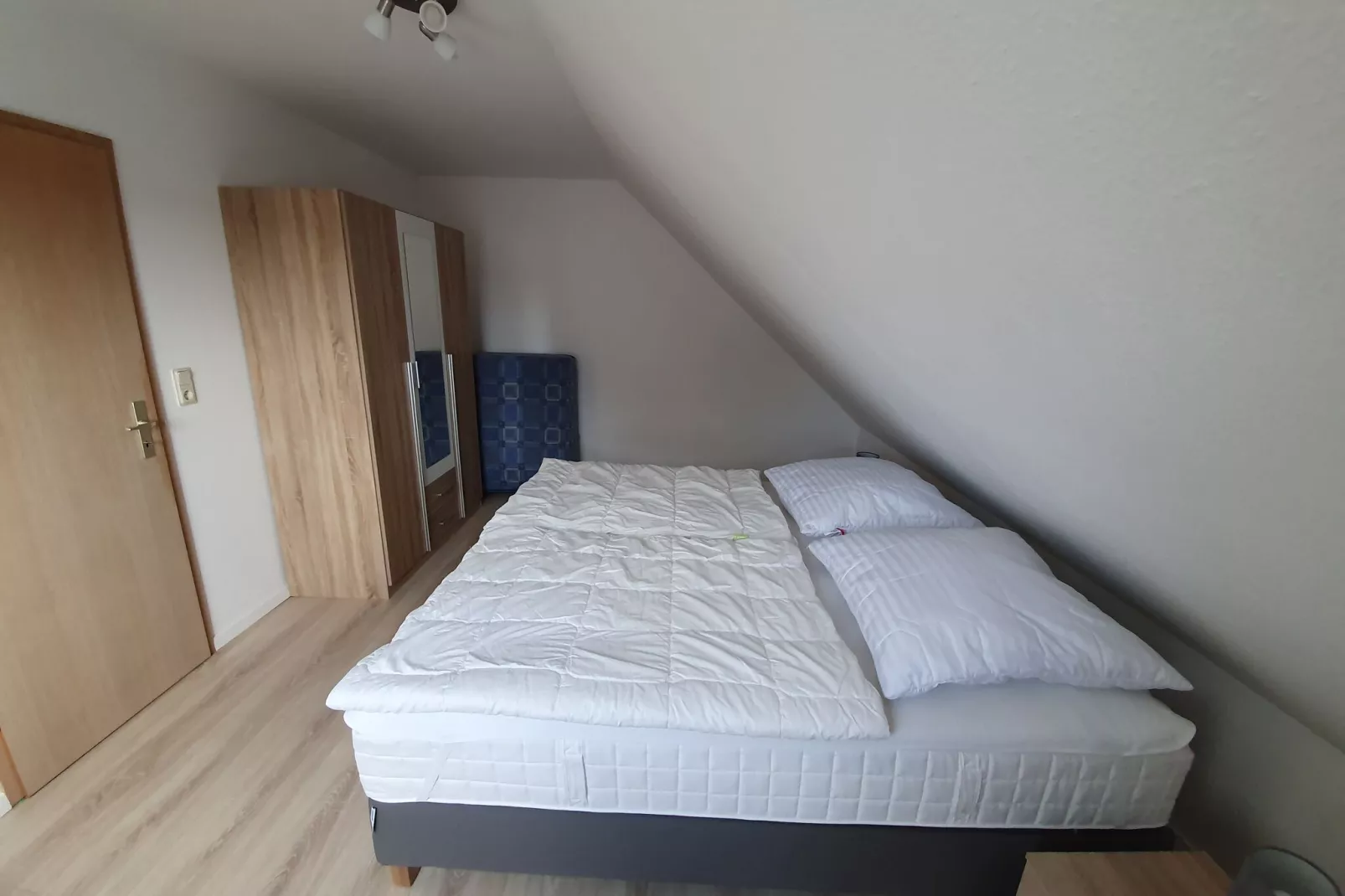 Doppelhaushälfte mit Sonnenterrasse in Neßmersiel-Bedroom