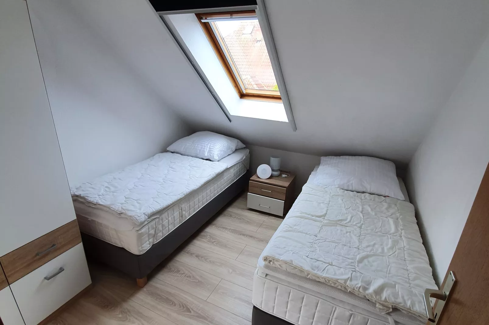 Doppelhaushälfte mit Sonnenterrasse in Neßmersiel-Bedroom