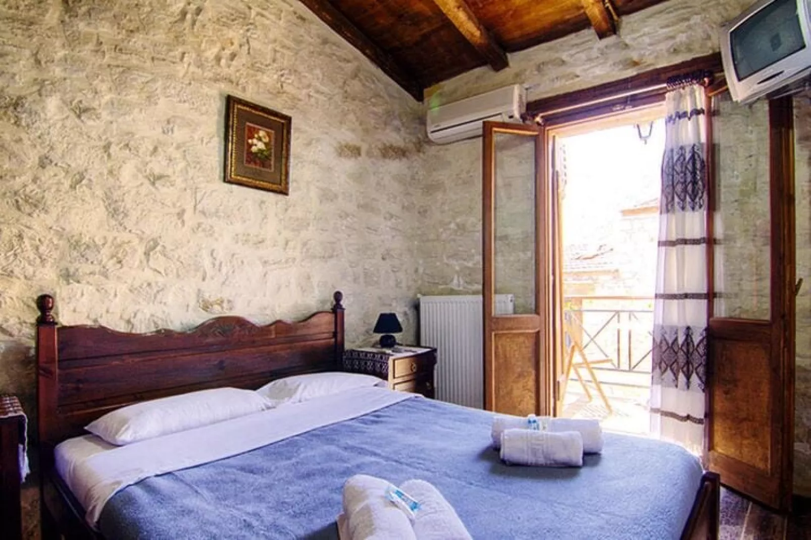 Holiday homes Stone Village Bali - Studio with halfboard-Bedroom