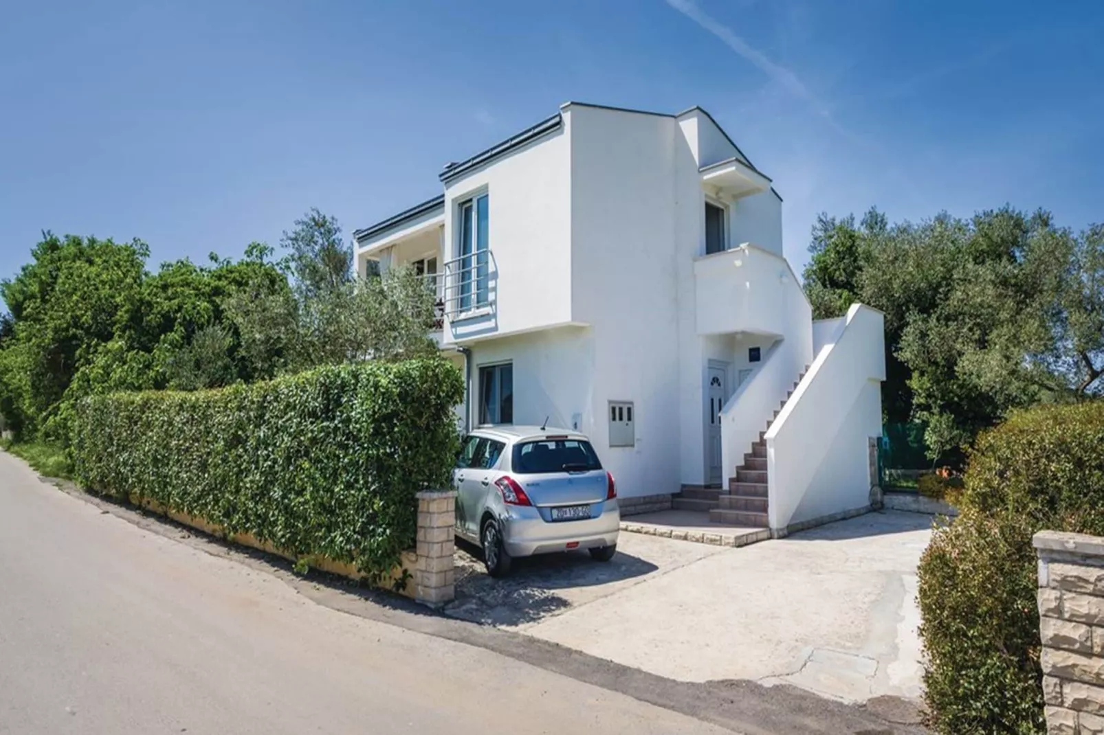 Holiday home Marija-Exterior summer