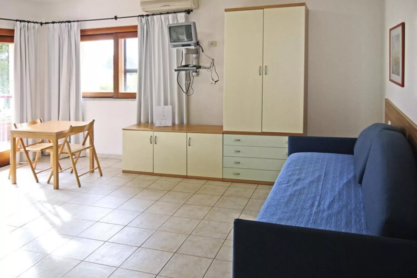Holiday residence Il Nido dei Gabbiani Porto Pollo / Bilo comfort 4 pax con 2 bagni-Living room