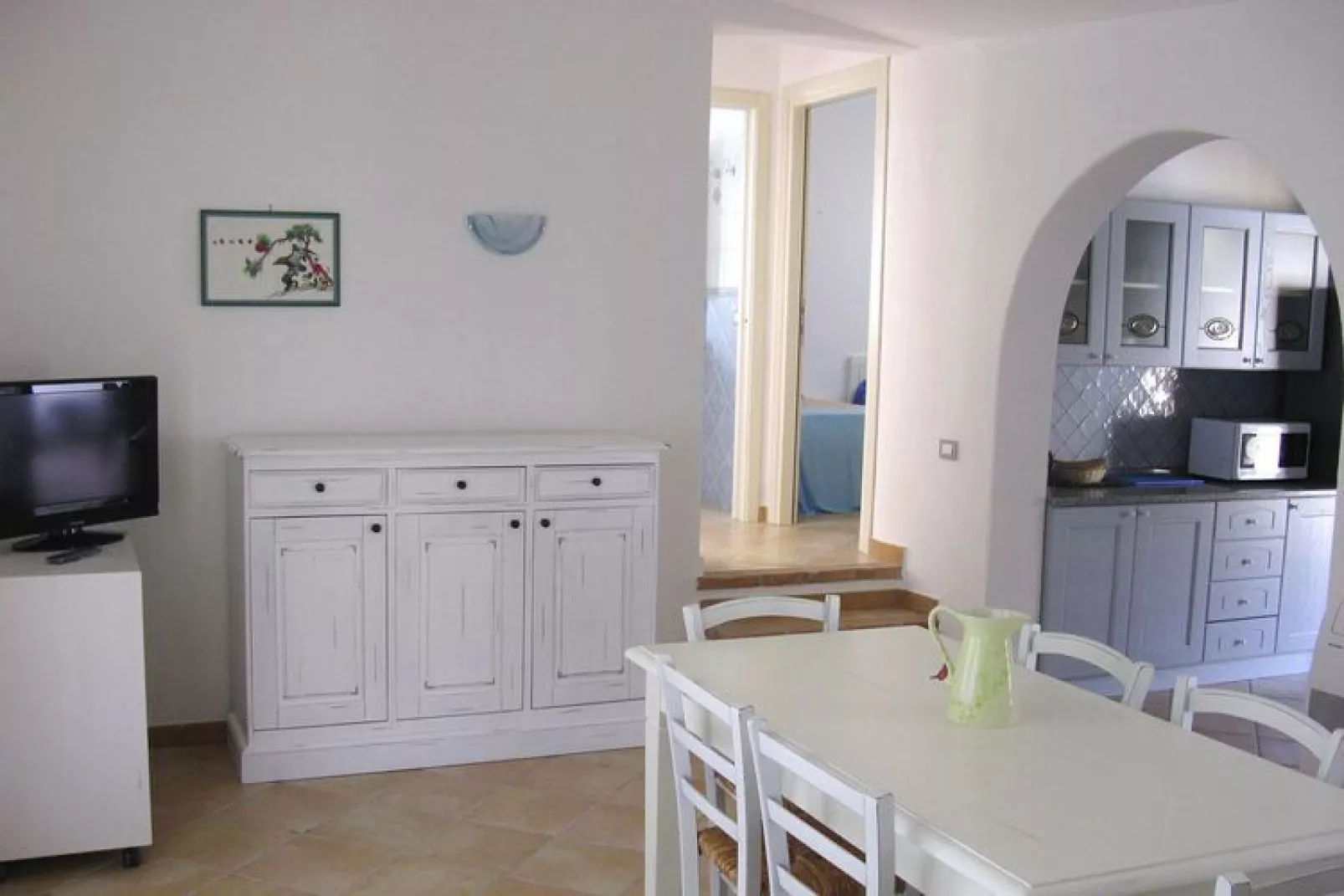 Row bungalows an der Costa Rei-San Pietro Villa 4/6 pers Unifamiliare con piscina comune-Wohnzimmer