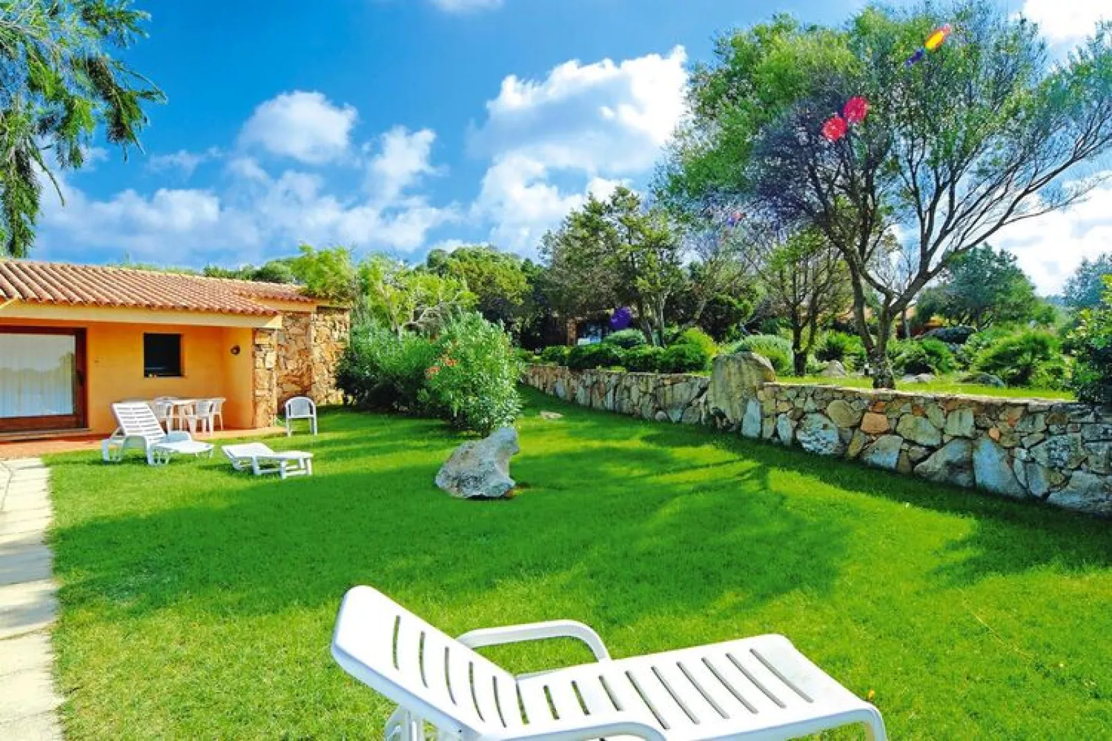 Holiday residence Il Nido dei Gabbiani Porto Pollo / Bilo Plus 5 pax in a row house-Gardens summer