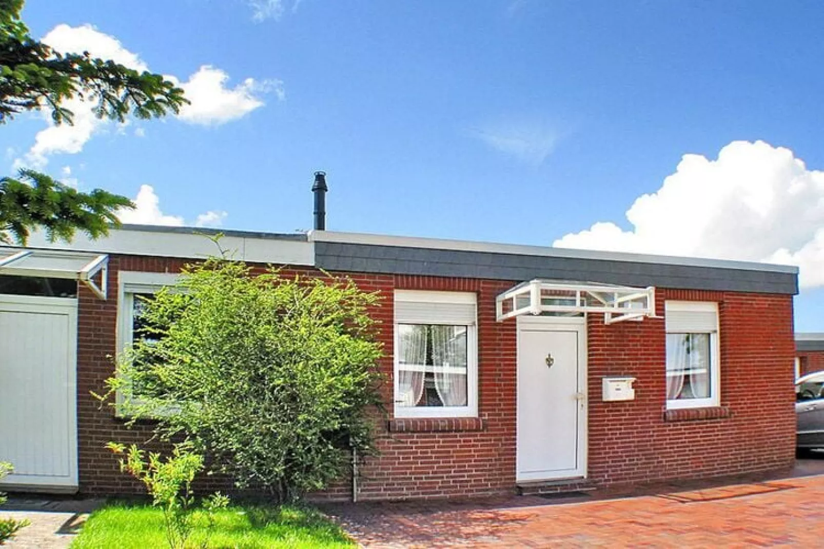 Ferienbungalow in Dornumersiel-Exterior summer
