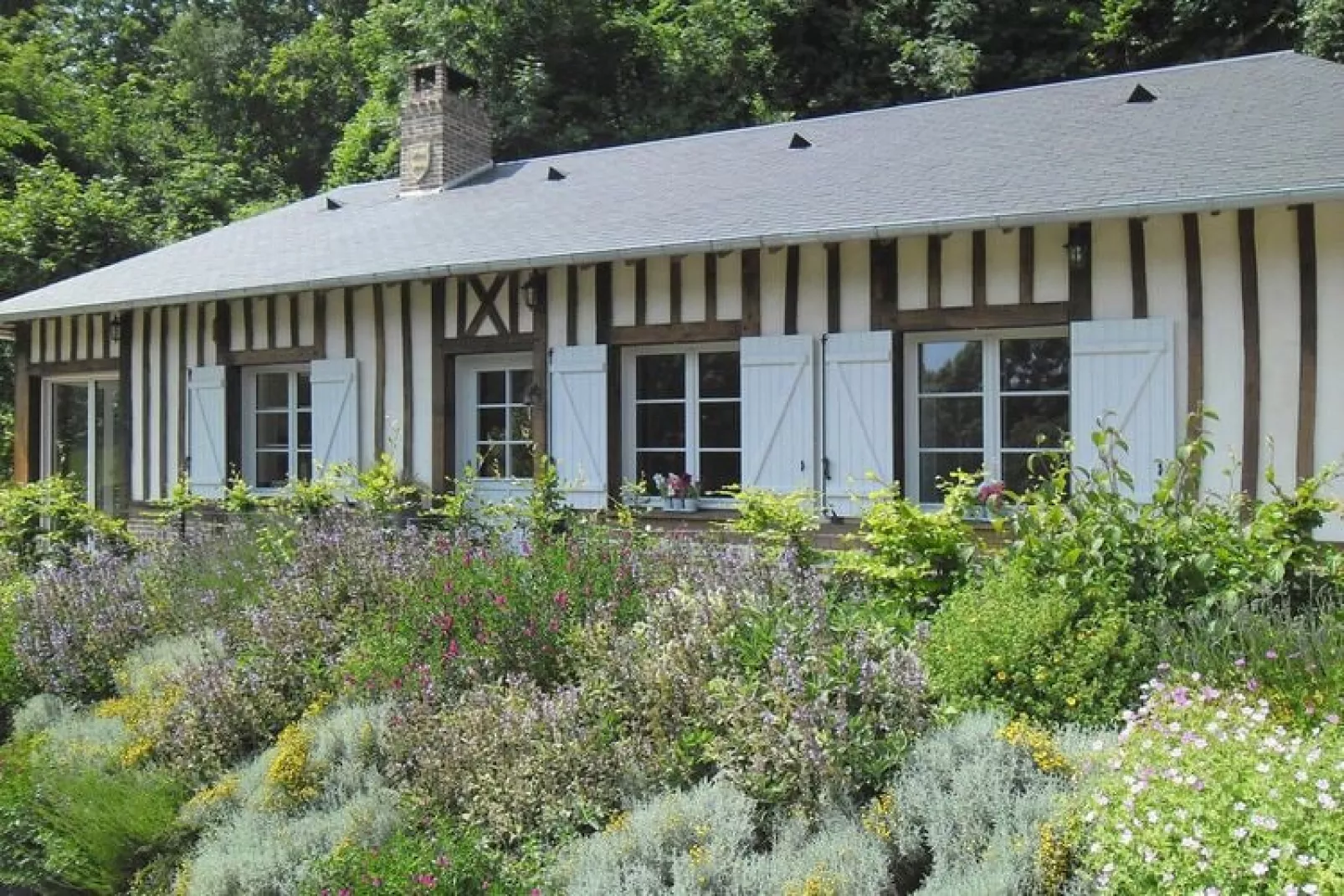 Holiday home St Martin-aux-Buneaux-Exterior in summer