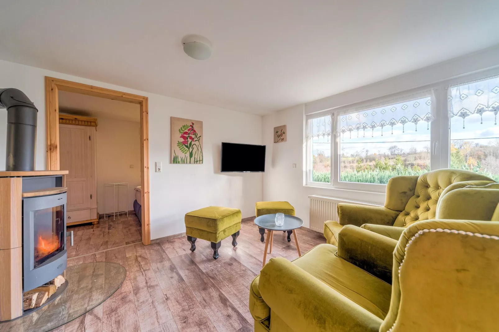 Holiday home with terrace next to the forest-Living room