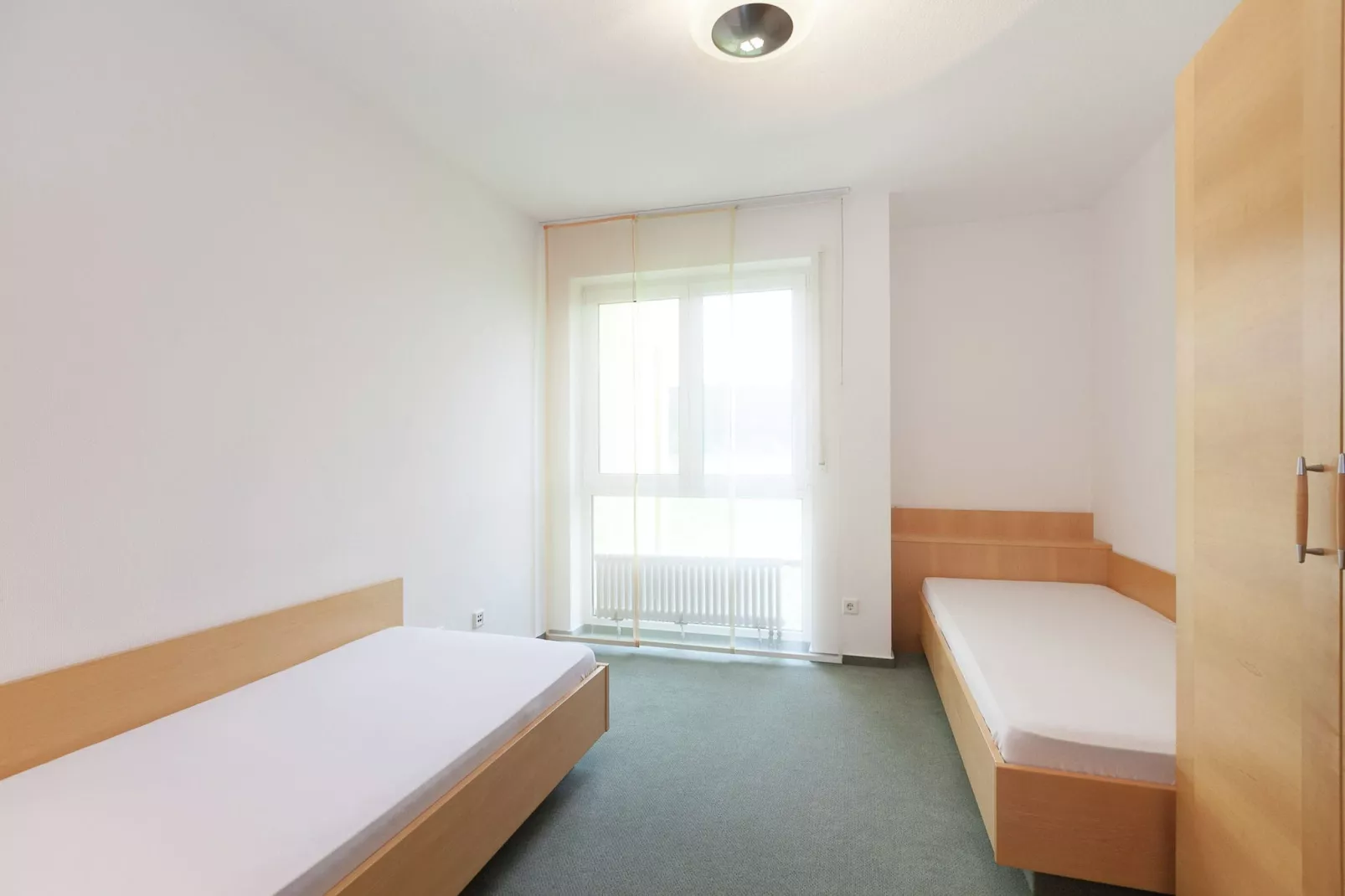 Apartmenthaus SportCHALET-Schlafzimmer