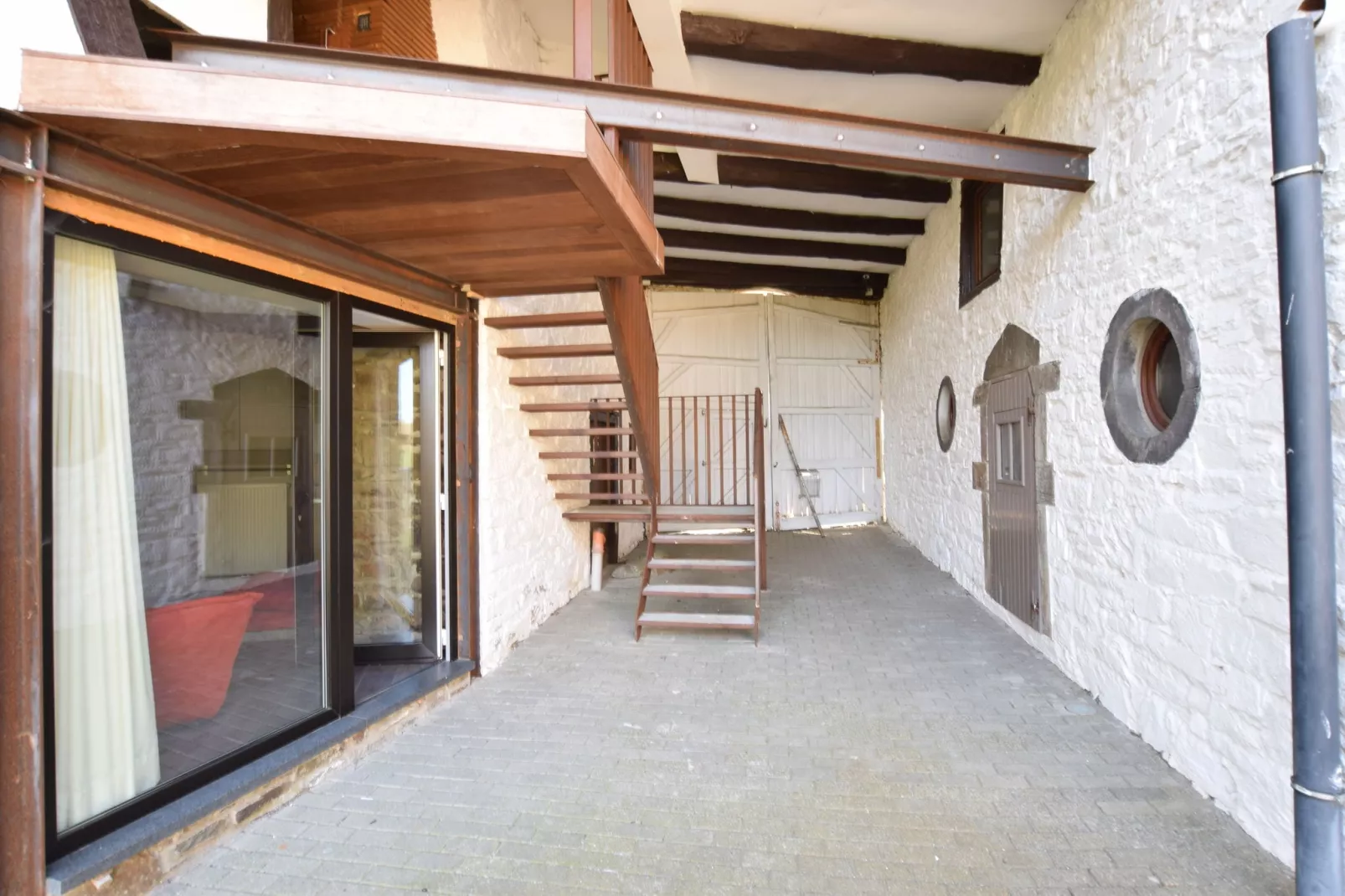 Koetshuis Appartement-Empfangshalle