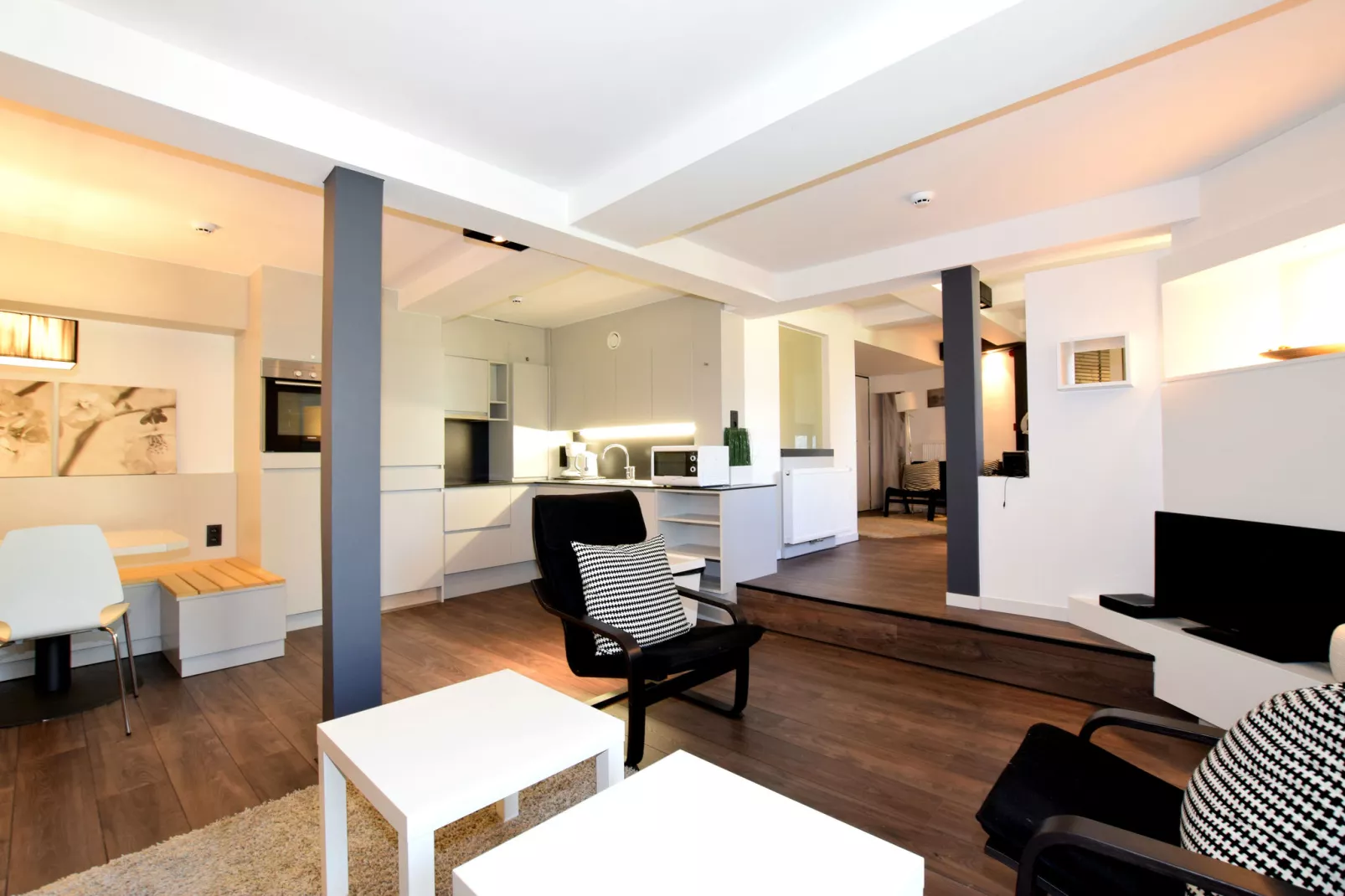 Koetshuis Appartement-Wohnzimmer