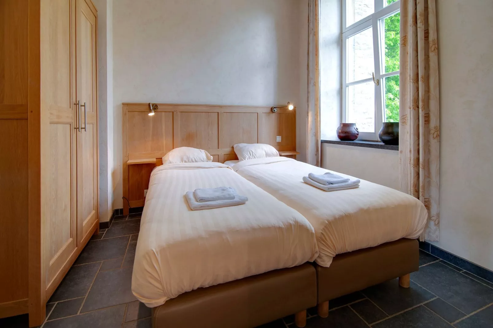 Appartement voor vier Domain Château Dieupart-Schlafzimmer
