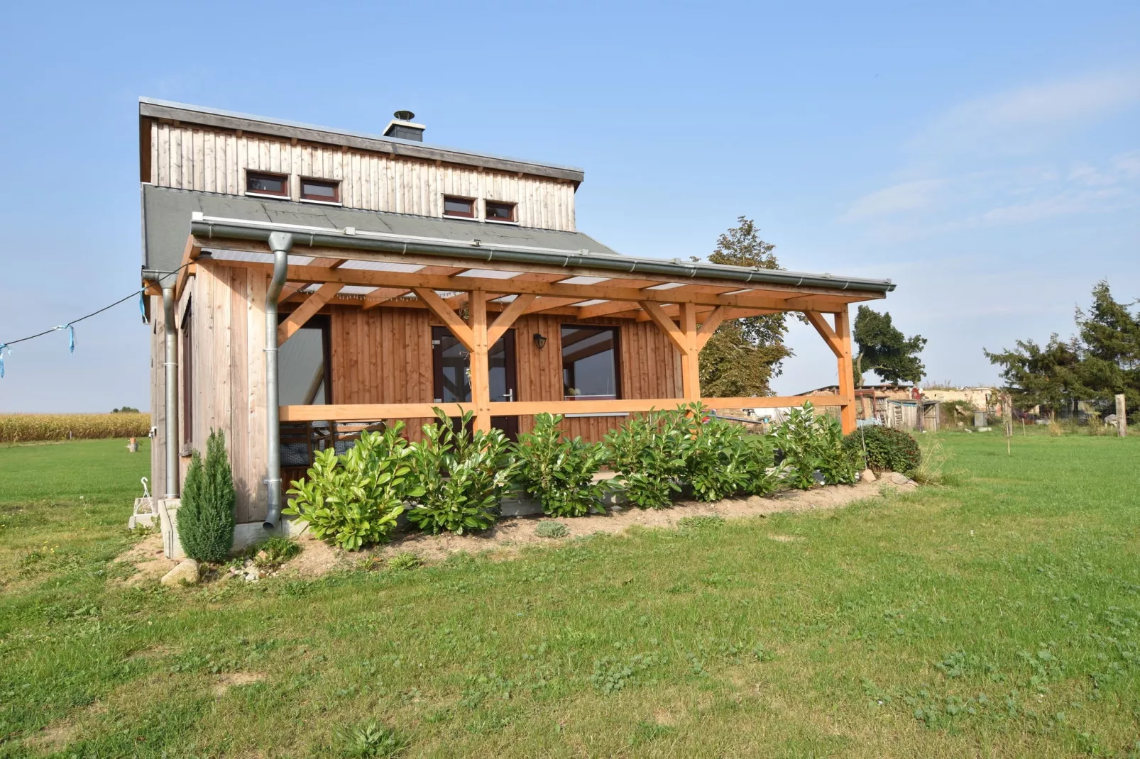 Ferienhaus Am See mit Kamin-Exterior summer