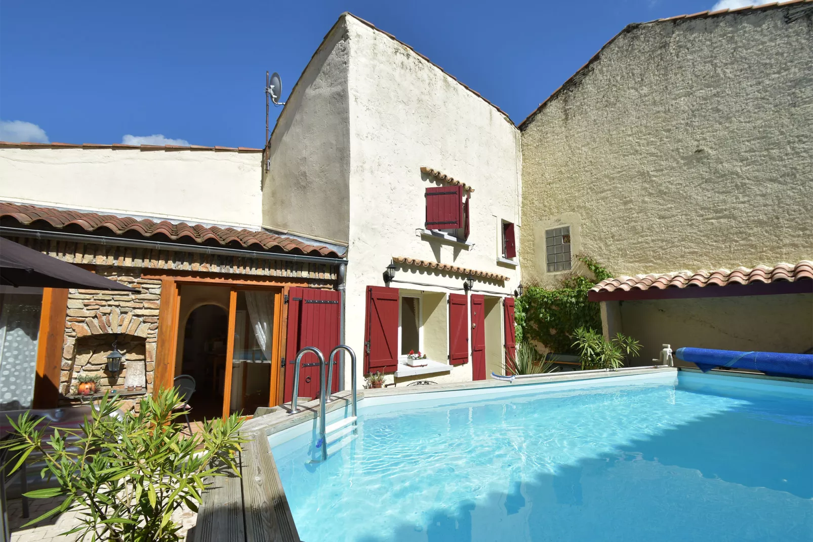 Holiday home with pool in Cuxac-Cabardès-Exterior summer