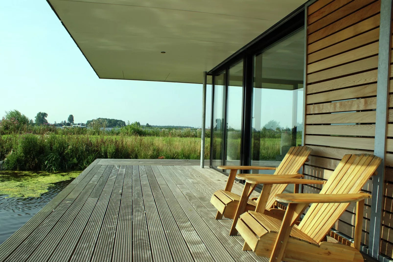 Watervilla de Blauwe Reiger-Terrassenbalkon