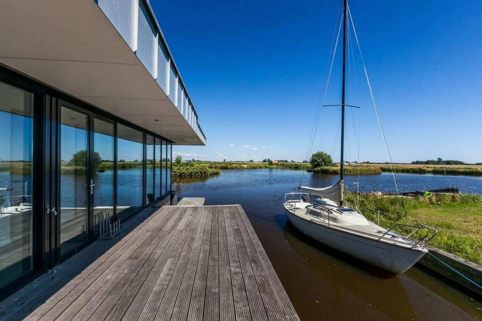 Watervilla de Blauwe Reiger-Gärten Sommer