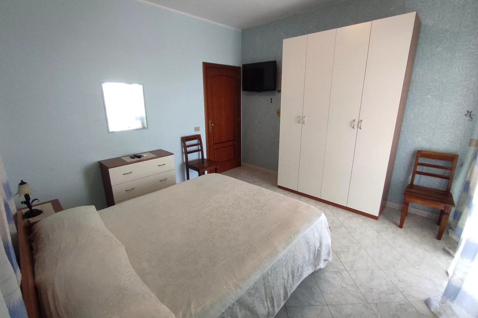 Appartamento Le Palme-Bedroom
