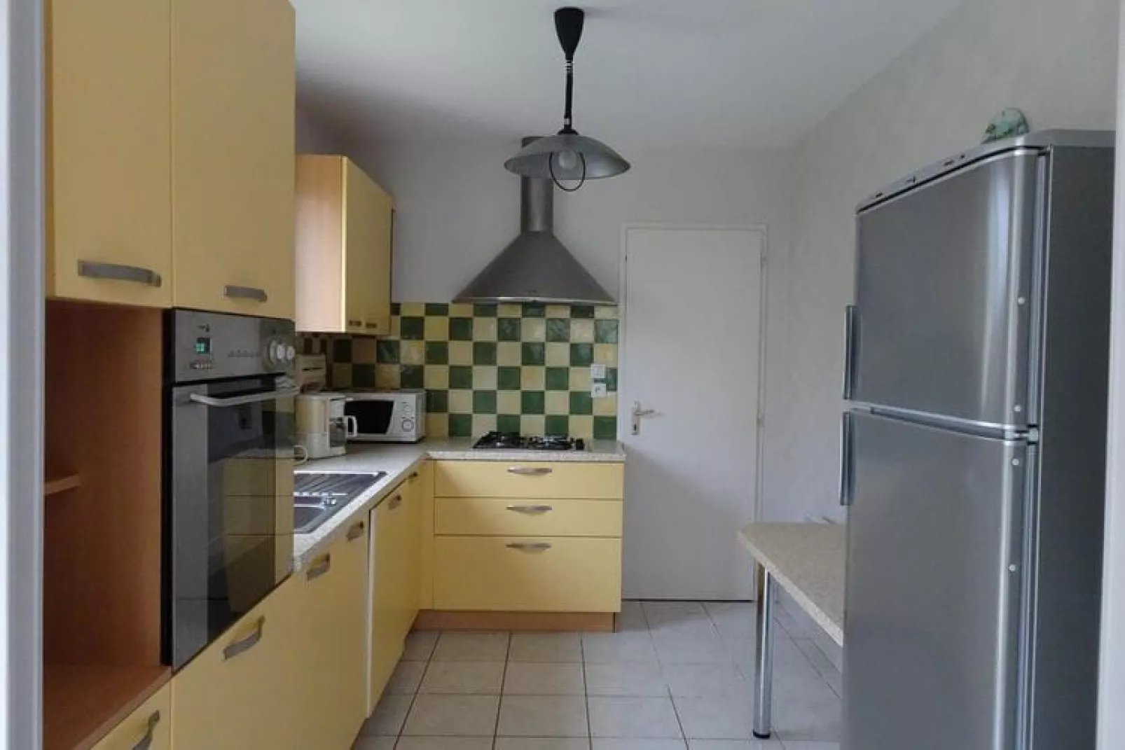 Holiday home Le Tour-du-Parc-Kitchen