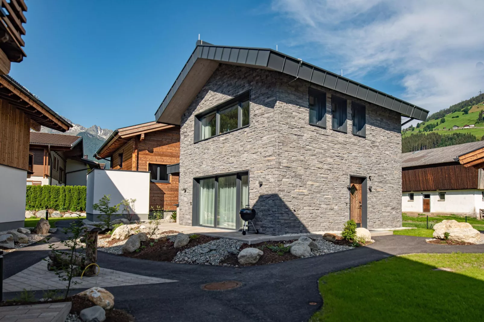 Feriendorf Das Dorf - Steinhaus-Exterior summer