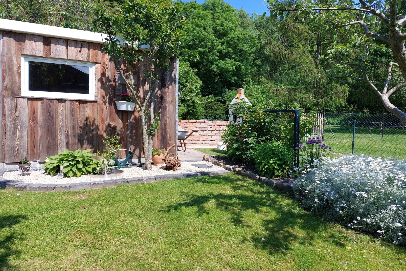 Bungalow Andrea am Salzhaff mit Garten-Gardens summer
